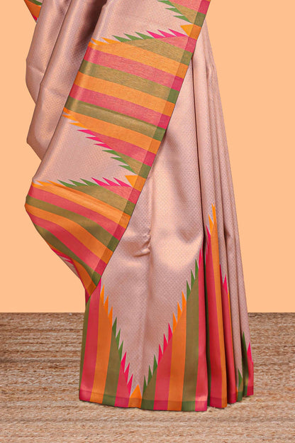 Pale pink plain litchi silk saree with contrast multi color ikkat style border and blouse