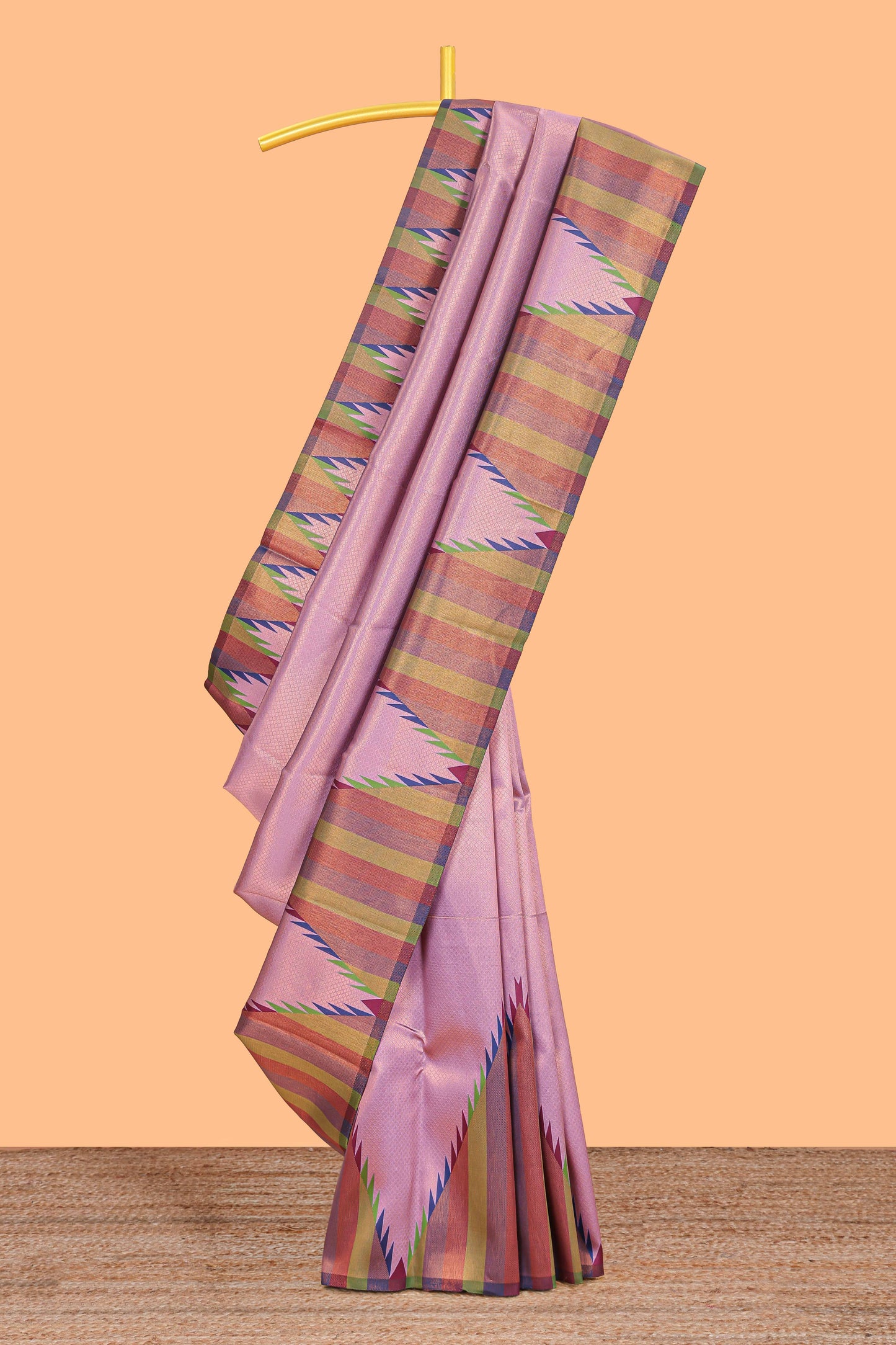 Lavender pink plain litchi silk saree with contrast multi color ikkat style border and blouse