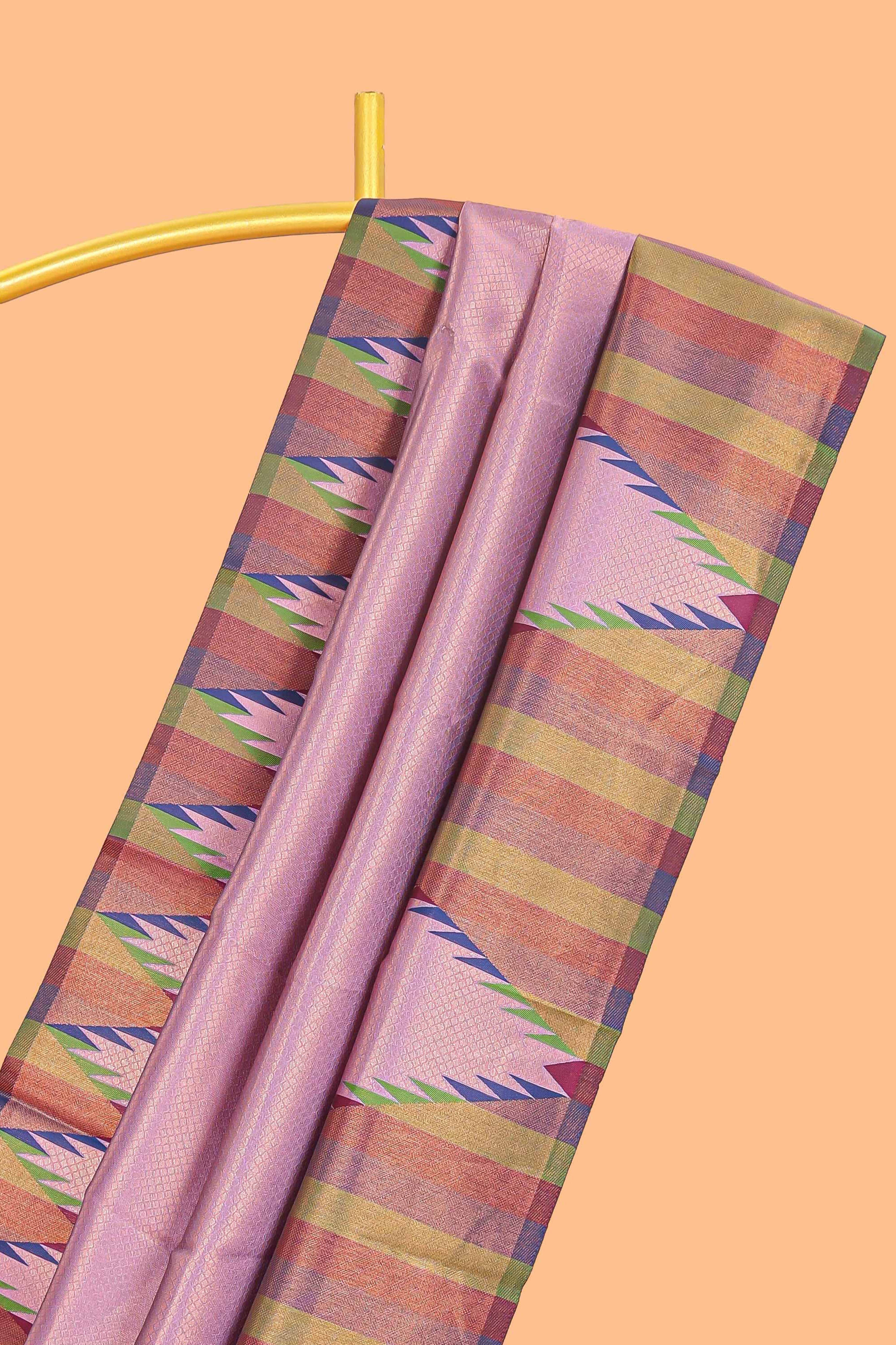 Lavender pink plain litchi silk saree with contrast multi color ikkat style border and blouse