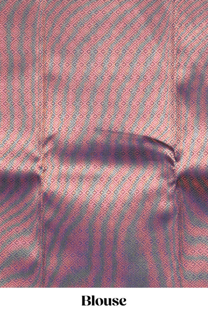 Lavender pink plain litchi silk saree with contrast multi color ikkat style border and blouse