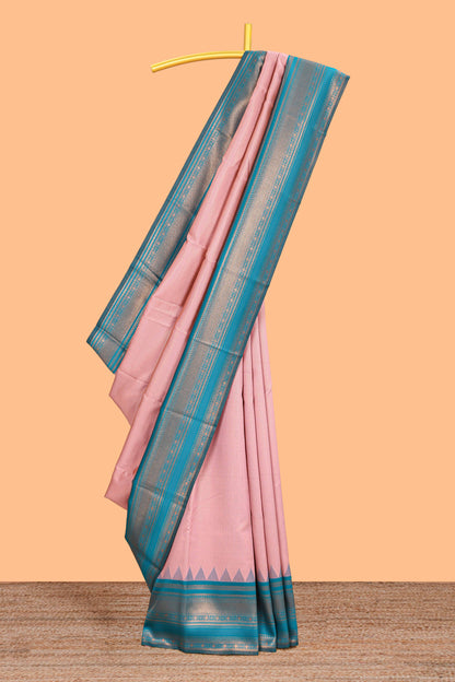 Pink zari textured litchi silk saree with contrast zari border and floral motifs blouse