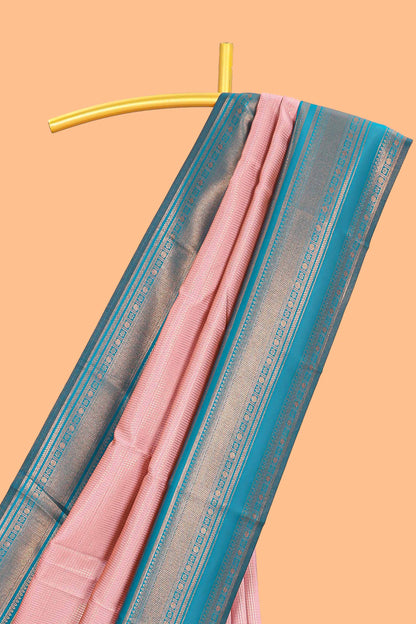 Pink zari textured litchi silk saree with contrast zari border and floral motifs blouse