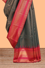 Black zari textured litchi silk saree with contrast zari border and floral motifs blouse