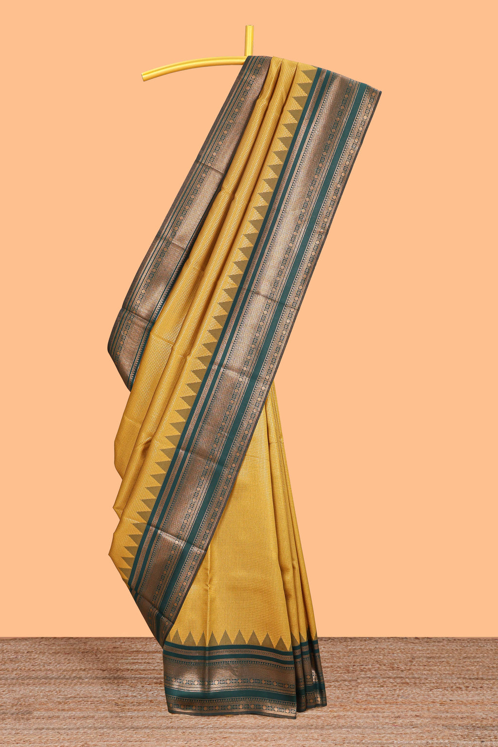 Mustard zari textured litchi silk saree with contrast zari border and floral motifs blouse