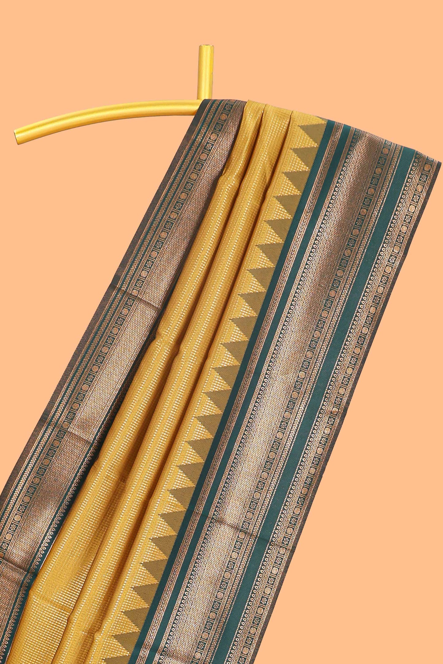 Mustard zari textured litchi silk saree with contrast zari border and floral motifs blouse