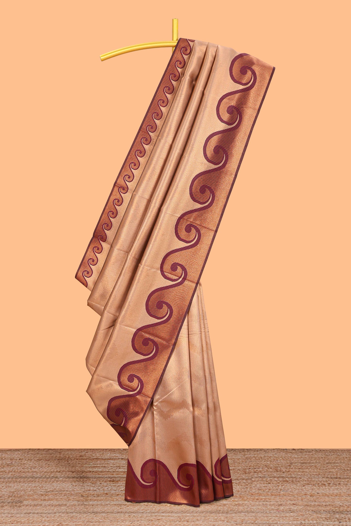 Beige chevron zari design litchi silk saree with contrast swirl shape zari border and blouse
