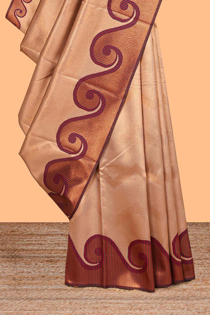 Beige chevron zari design litchi silk saree with contrast swirl shape zari border and blouse