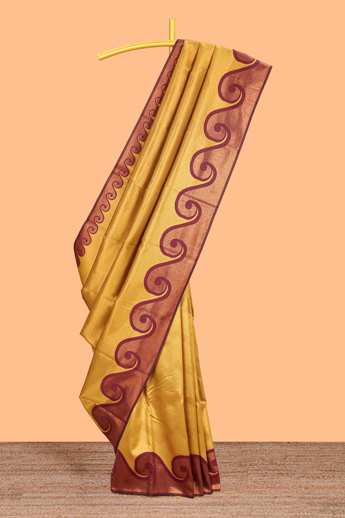 Yellow chevron zari design litchi silk saree with contrast swirl shape zari border and blouse
