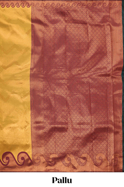 Yellow chevron zari design litchi silk saree with contrast swirl shape zari border and blouse