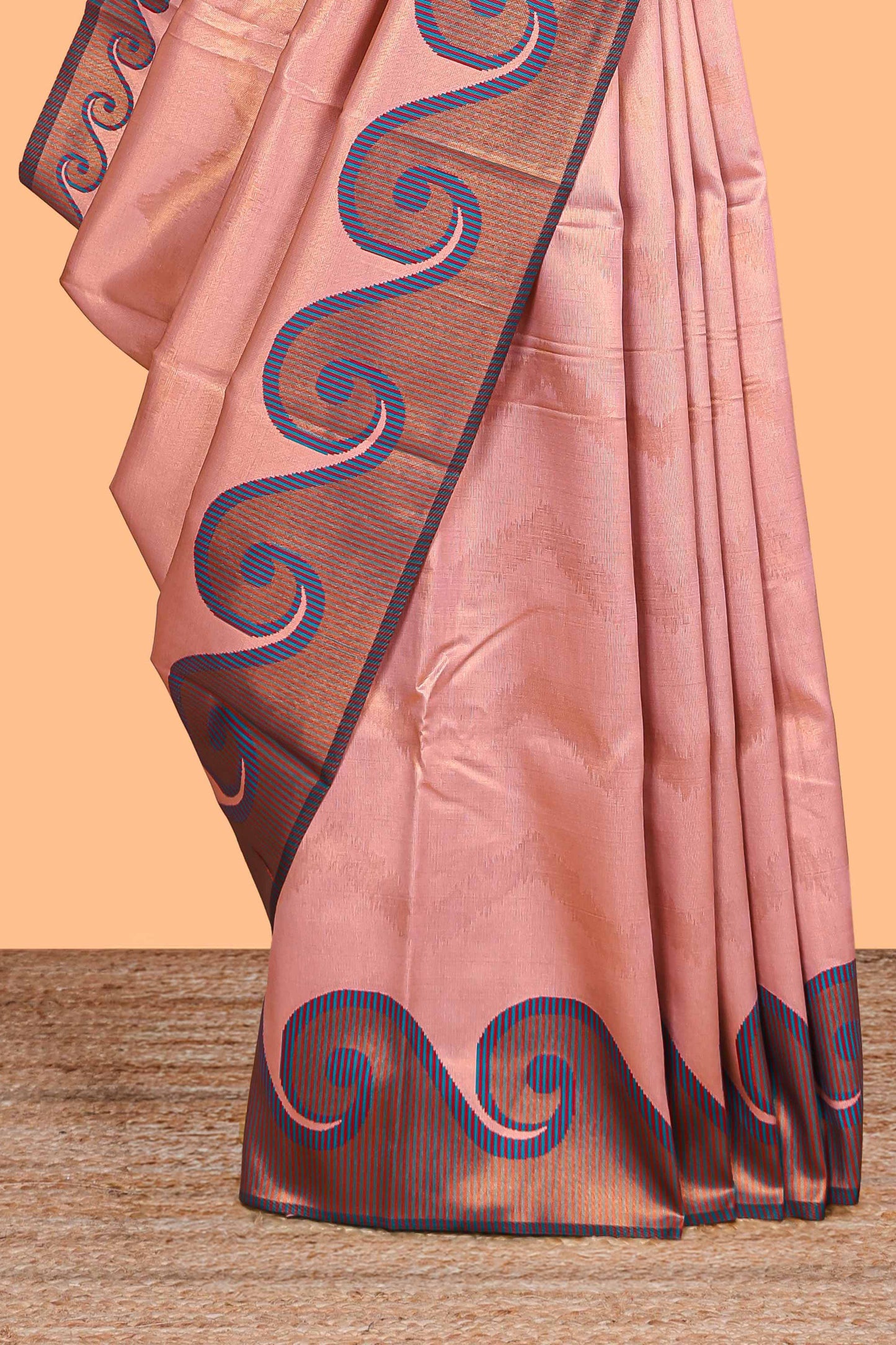 Pink chevron zari design litchi silk saree with contrast swirl shape zari border and blouse