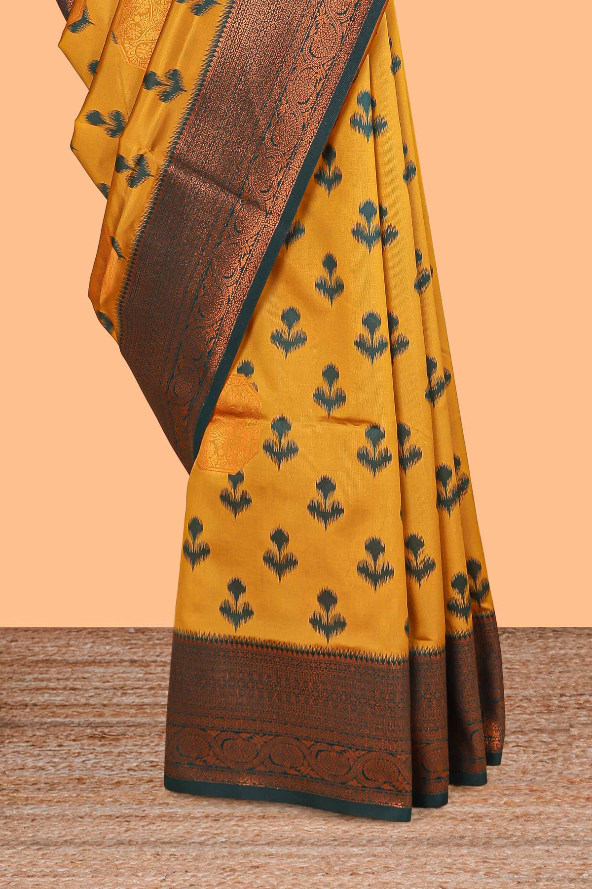 Mustard floral design zari motifs litchi silk saree with contrast zari border and blouse