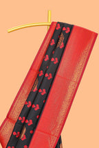 Black floral design zari motifs litchi silk saree with contrast zari border and blouse