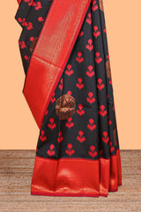 Black floral design zari motifs litchi silk saree with contrast zari border and blouse