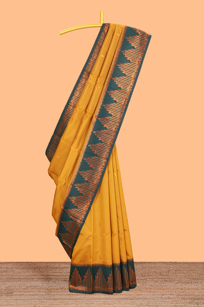 Golden yellow zari butta litchi silk saree with contrast zari border and blouse