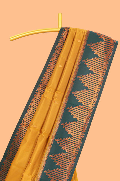 Golden yellow zari butta litchi silk saree with contrast zari border and blouse