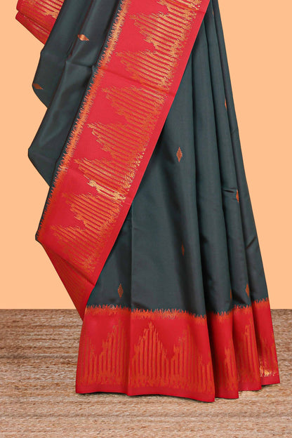 Pine green zari butta litchi silk saree with contrast zari border and blouse