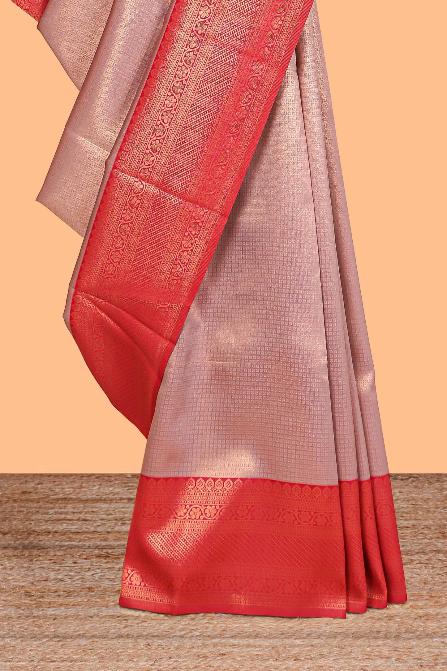 Peach small zari checked design litchi silk saree with contrast zari border and blouse