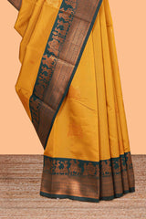 Mustard pallakku design zari buttas litchi silk saree with contrast zari border and blouse