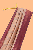 Beige chevron zari design litchi silk saree with contrast zari design border and contrast blouse