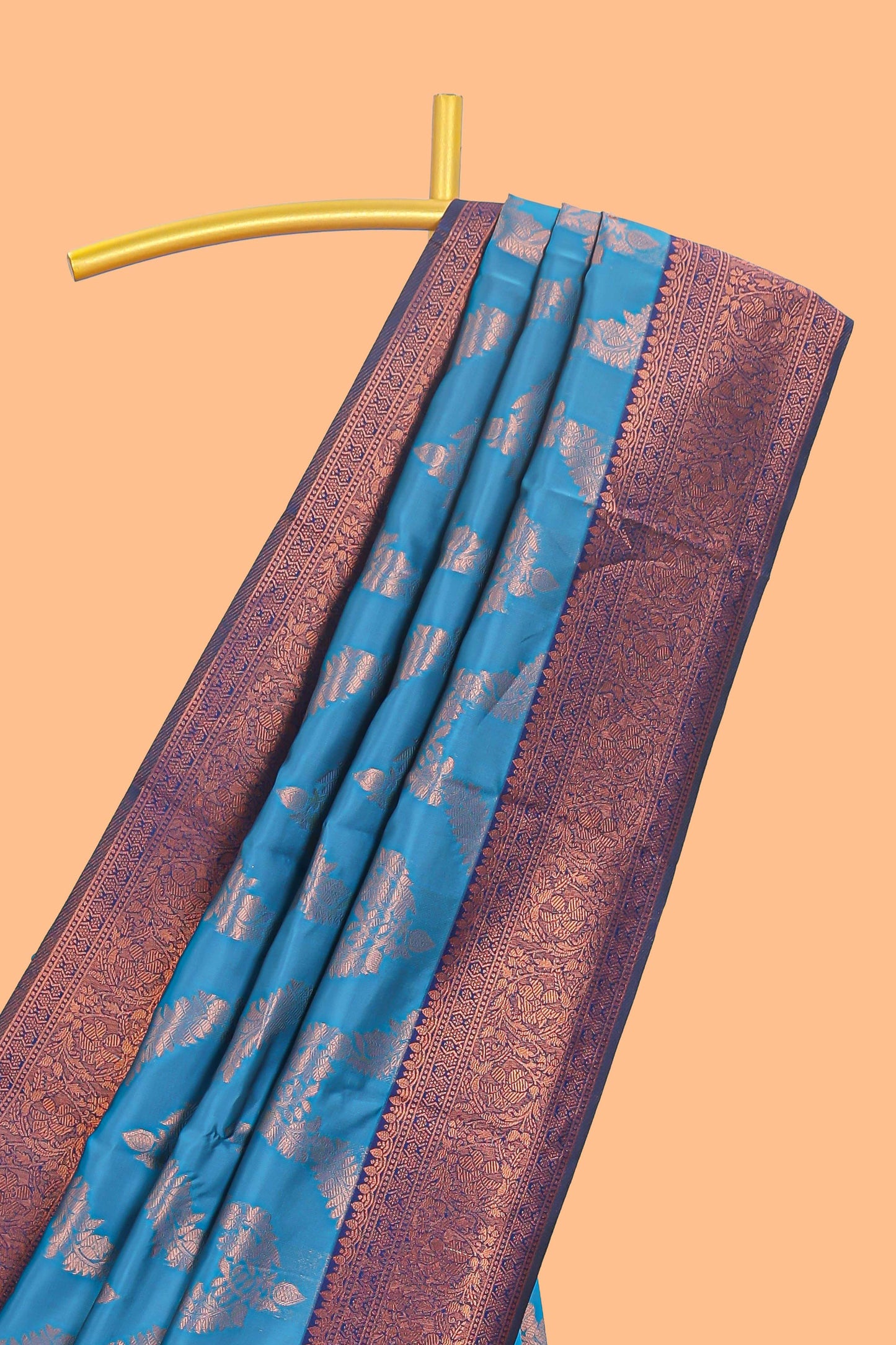Blue chevron zari design litchi silk saree with contrast zari design border and contrast blouse
