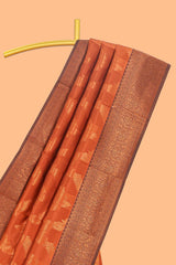 Orange chevron zari design litchi silk saree with contrast zari design border and contrast blouse