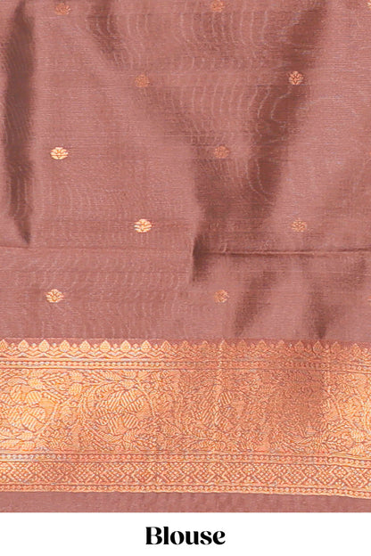 Orange chevron zari design litchi silk saree with contrast zari design border and contrast blouse