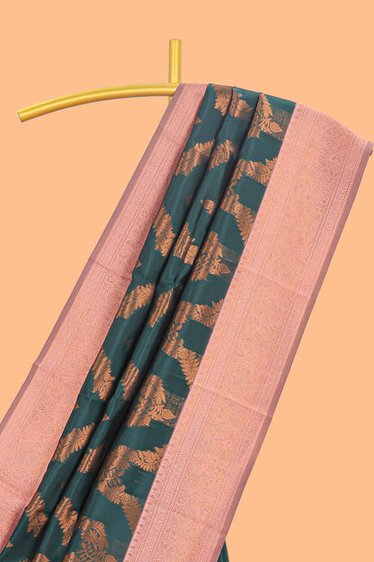 Green chevron zari design litchi silk saree with contrast zari design border and contrast blouse