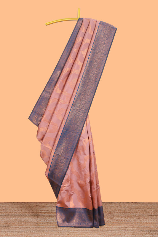 Pink chevron zari design litchi silk saree with contrast zari design border and contrast blouse