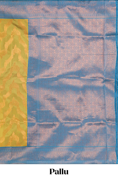 Mustard chevron zari design litchi silk saree with contrast zari design border and contrast blouse