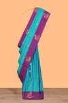 Ocean blue zari motifs design litchi silk saree with contrast zari design border and plain blouse