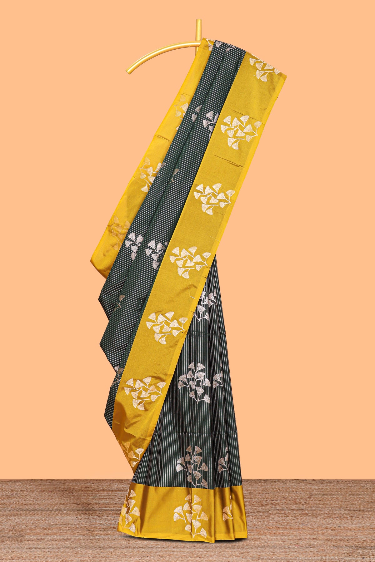 Green striped zari motifs design litchi silk saree with contrast zari design border and plain blouse