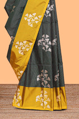 Green striped zari motifs design litchi silk saree with contrast zari design border and plain blouse