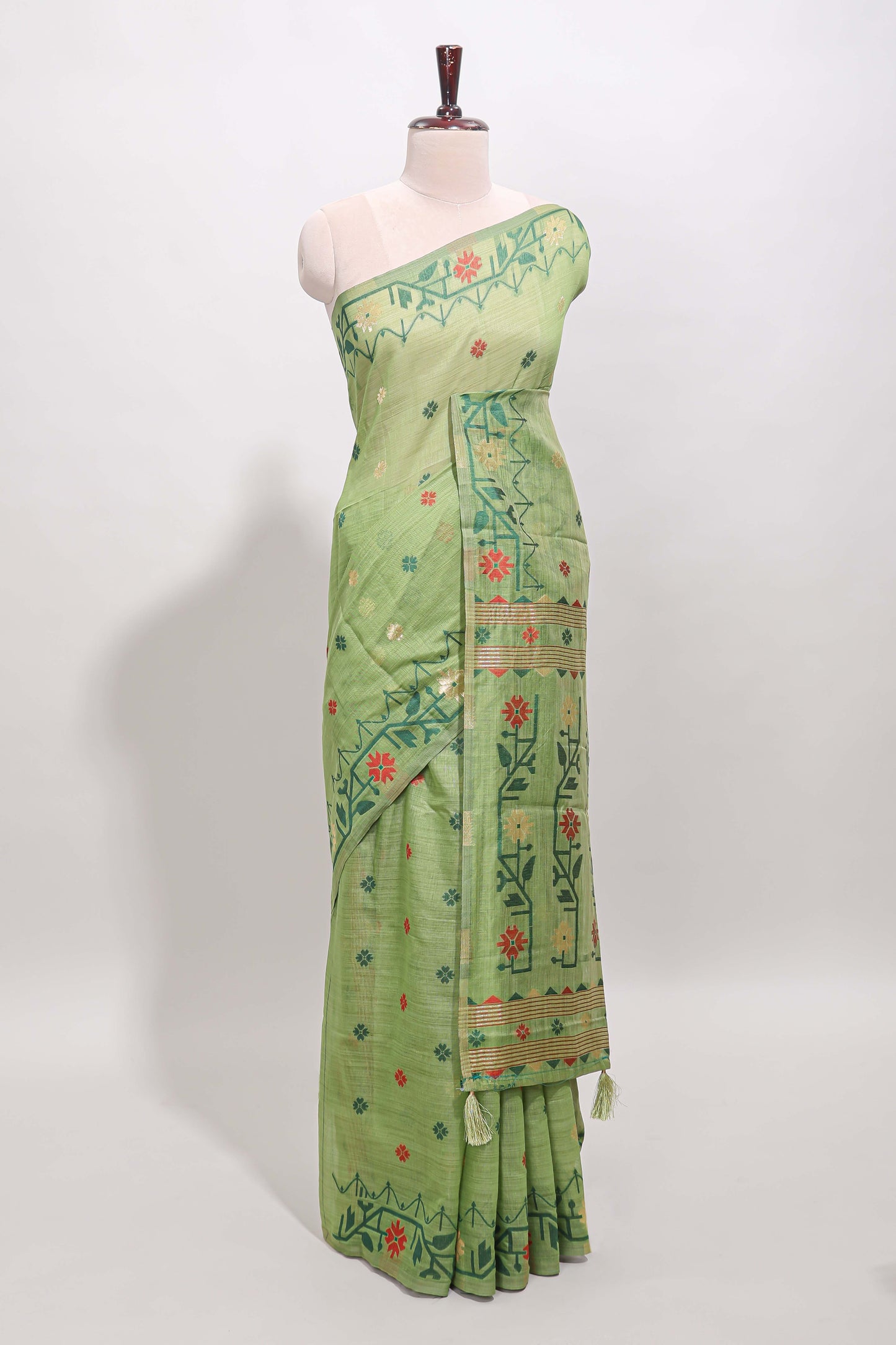 Green floral motifs munga cotton saree with self border matching blouse