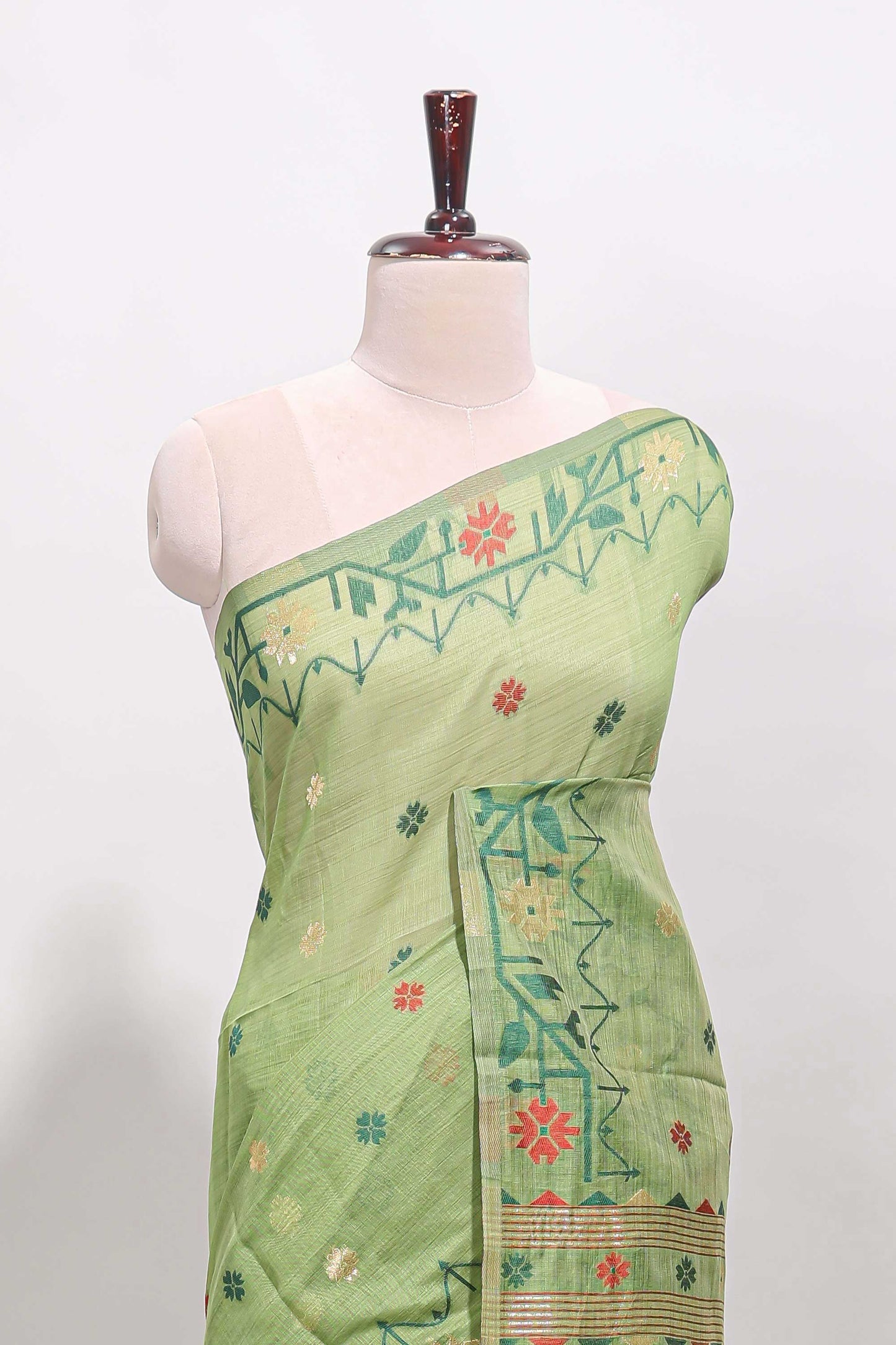 Green floral motifs munga cotton saree with self border matching blouse