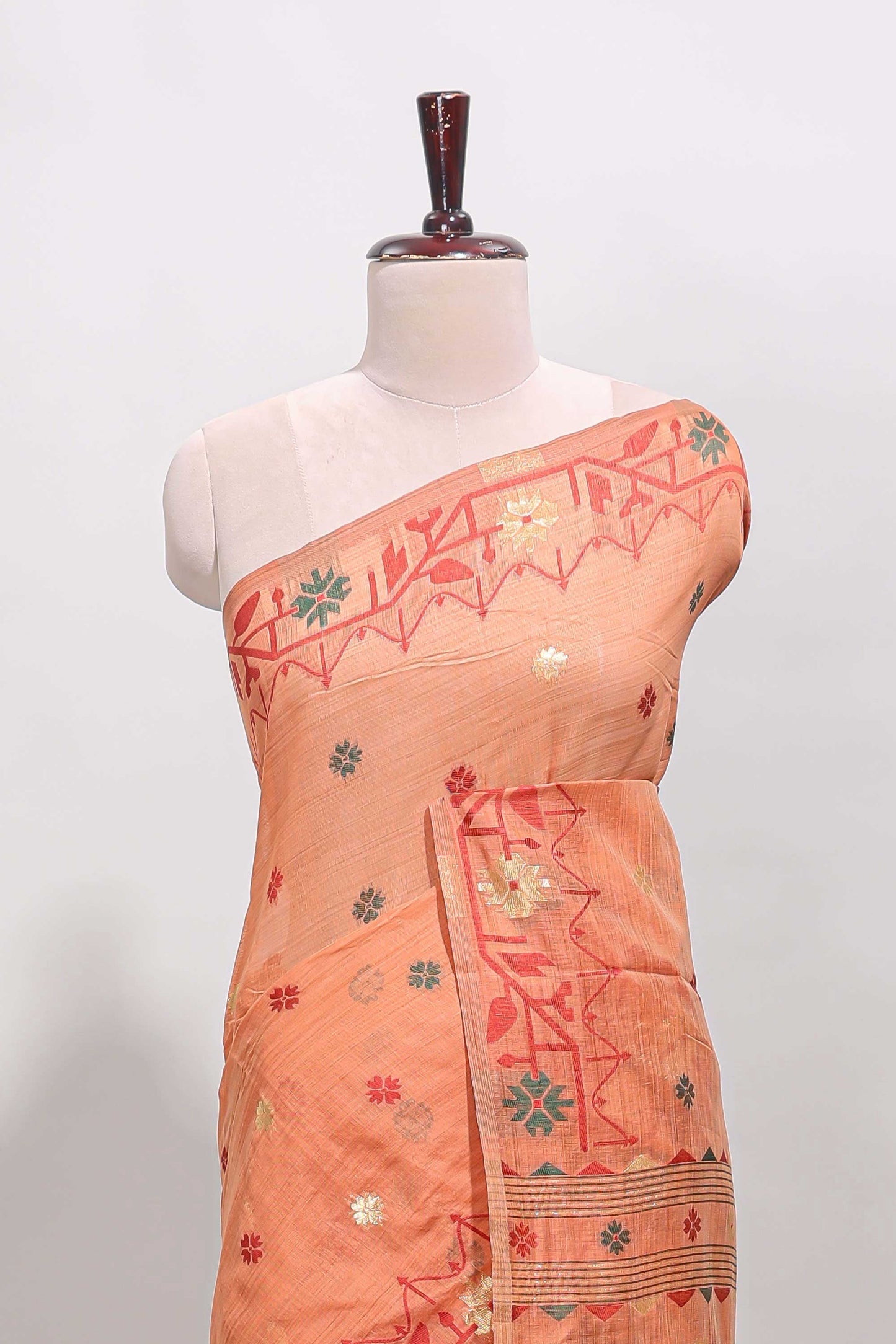 Orange floral motifs munga cotton saree with self border matching blouse