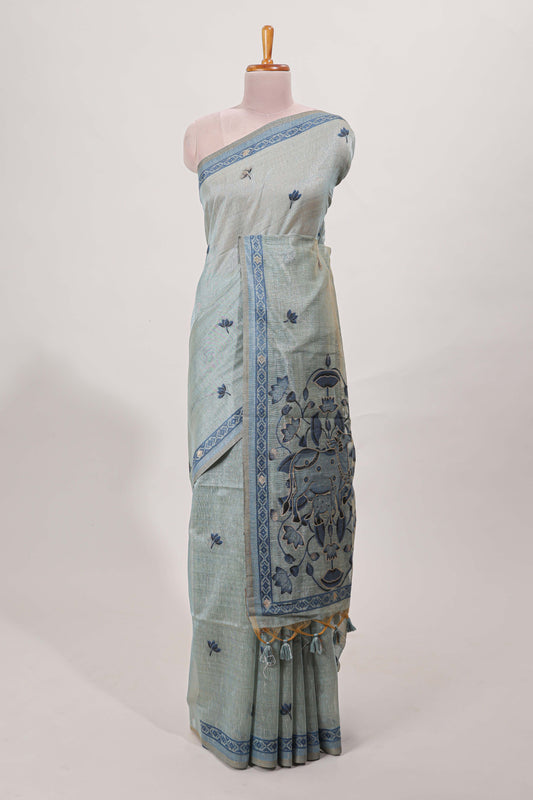 Blue munga cotton floral thread motifs thread weaving border with floral jaal thread zari pallu and contrast small butta blouse