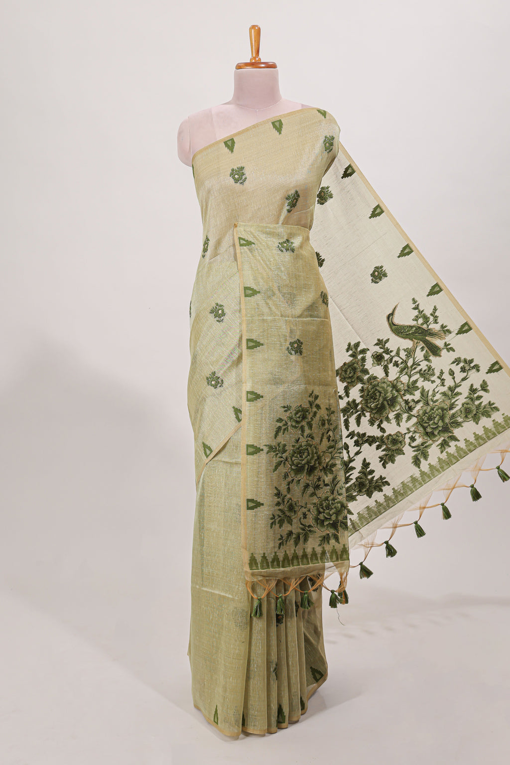 Green munga cotton floral thread motifs thread weaving border with floral jaal thread zari pallu and contrast small butta blouse
