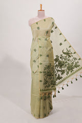 Green munga cotton floral thread motifs thread weaving border with floral jaal thread zari pallu and contrast small butta blouse