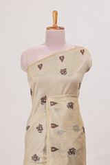Beige munga cotton floral thread motifs thread weaving border with floral jaal thread zari pallu and contrast small butta blouse