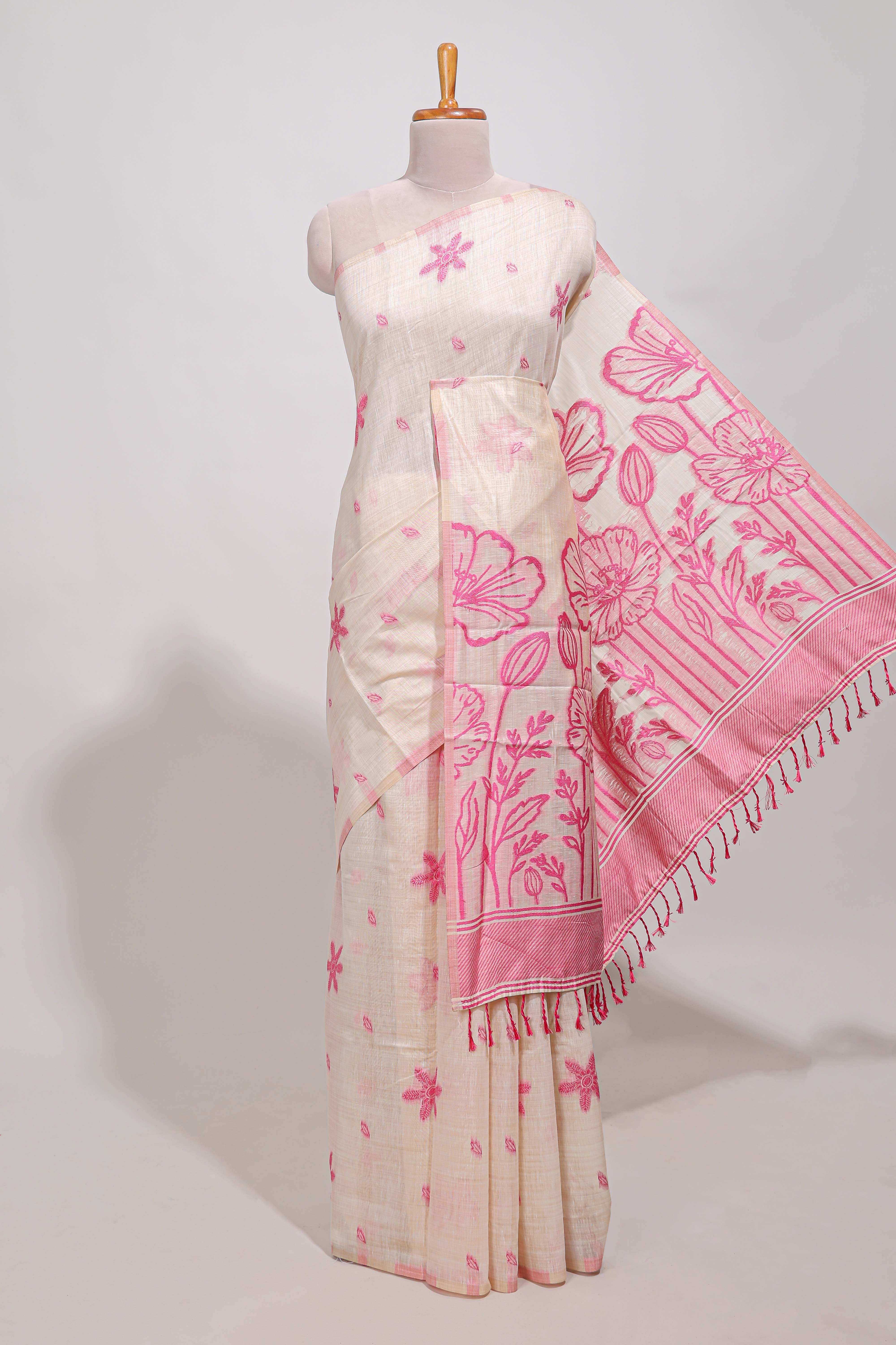 Pink floral printmunga cotton sareewith matching floral print pallu along with tassles