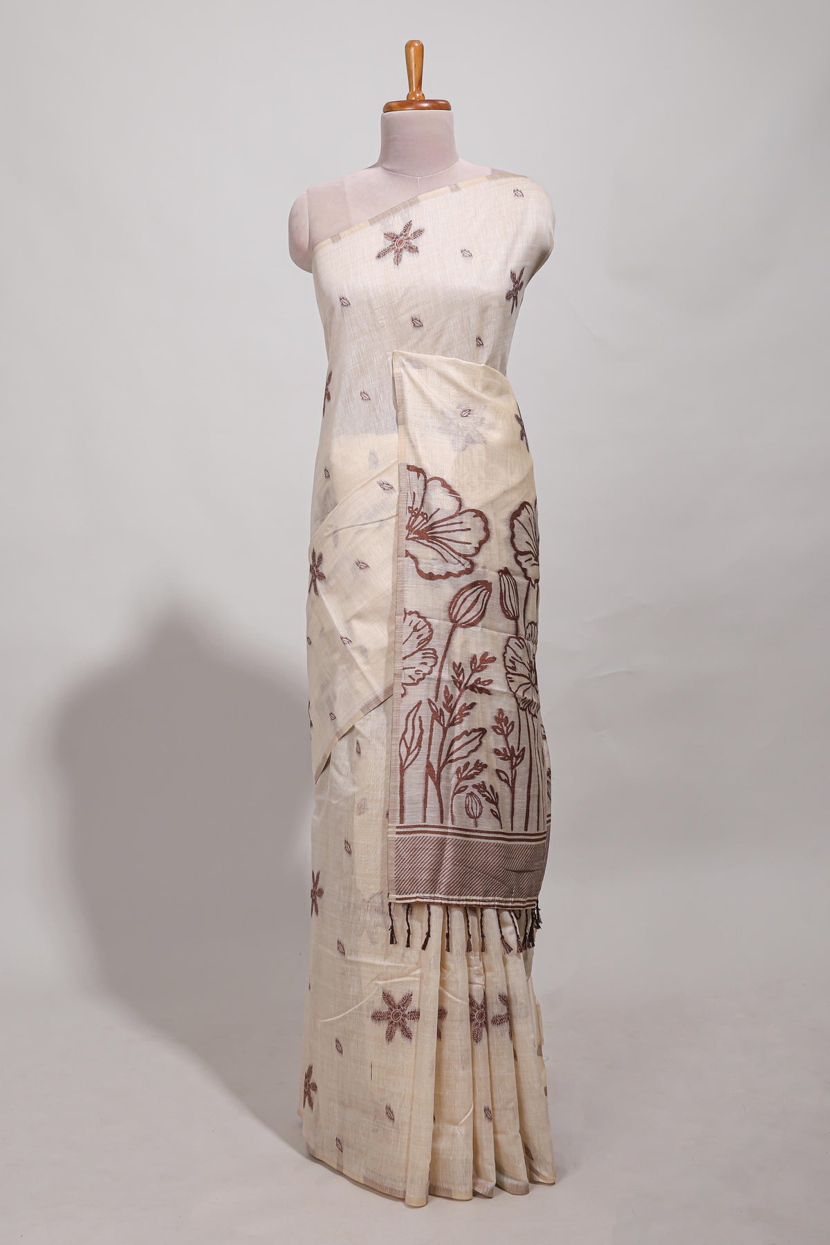 Brown floral print  munga cotton saree  with matching floral print pallu along with tassles