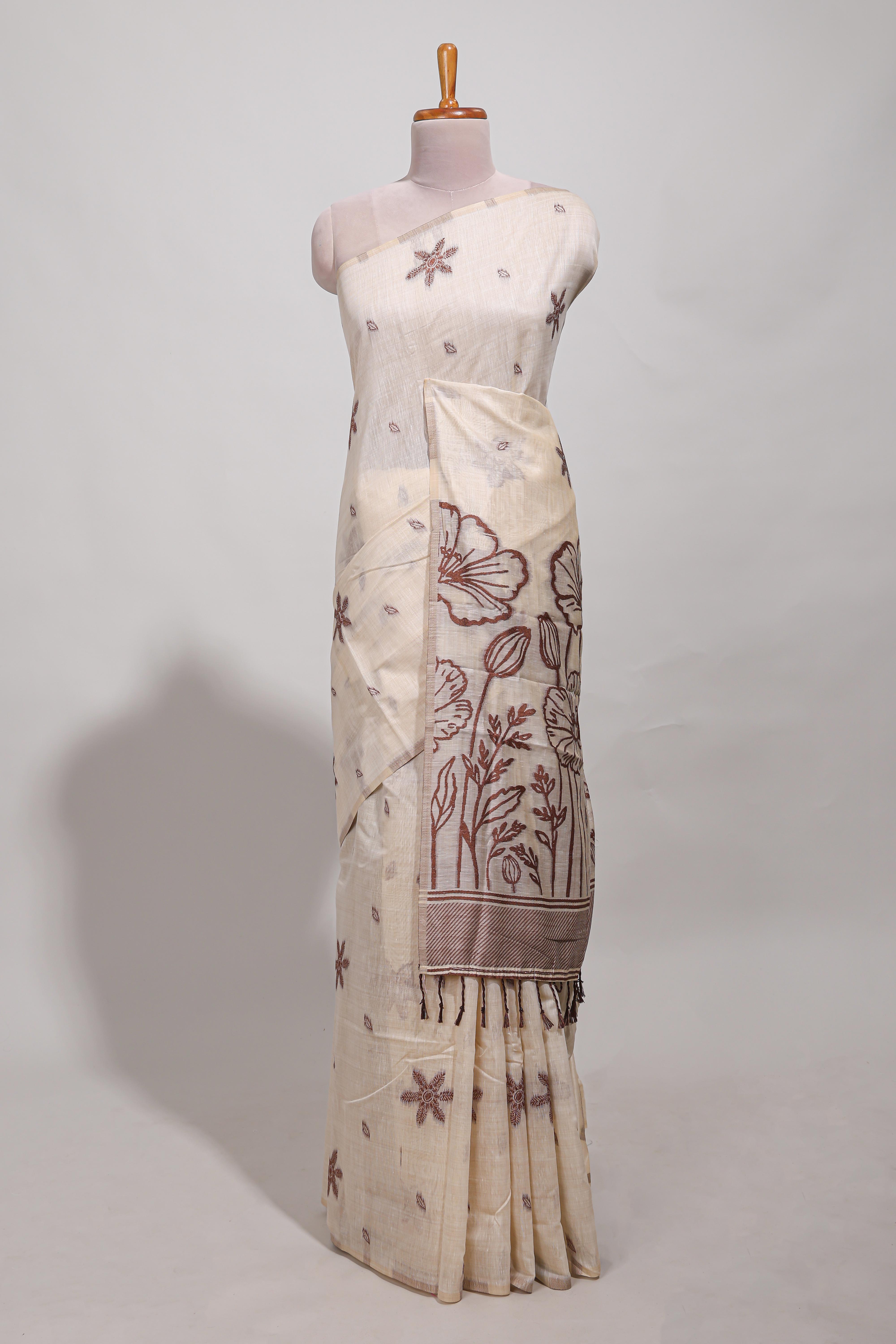 Brown floral printmunga cotton sareewith matching floral print pallu along with tassles