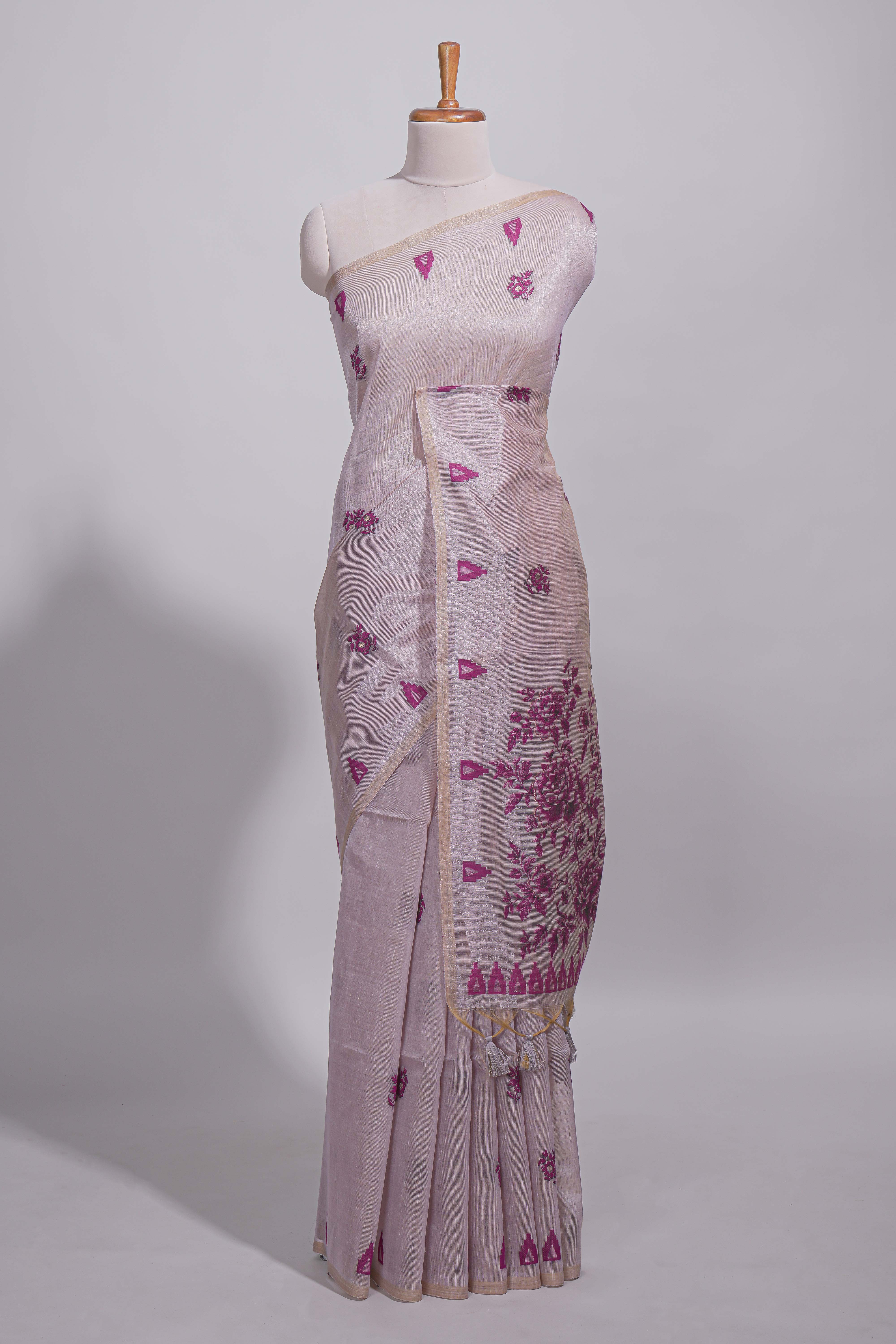 Magenta munga cotton all over floral thread motifs thread weaving border with floral jaal thread zari pallu and contrast small butta blouse