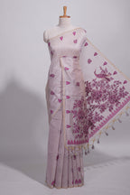 Magenta munga cotton all over floral thread motifs thread weaving border with floral jaal thread zari pallu and contrast small butta blouse