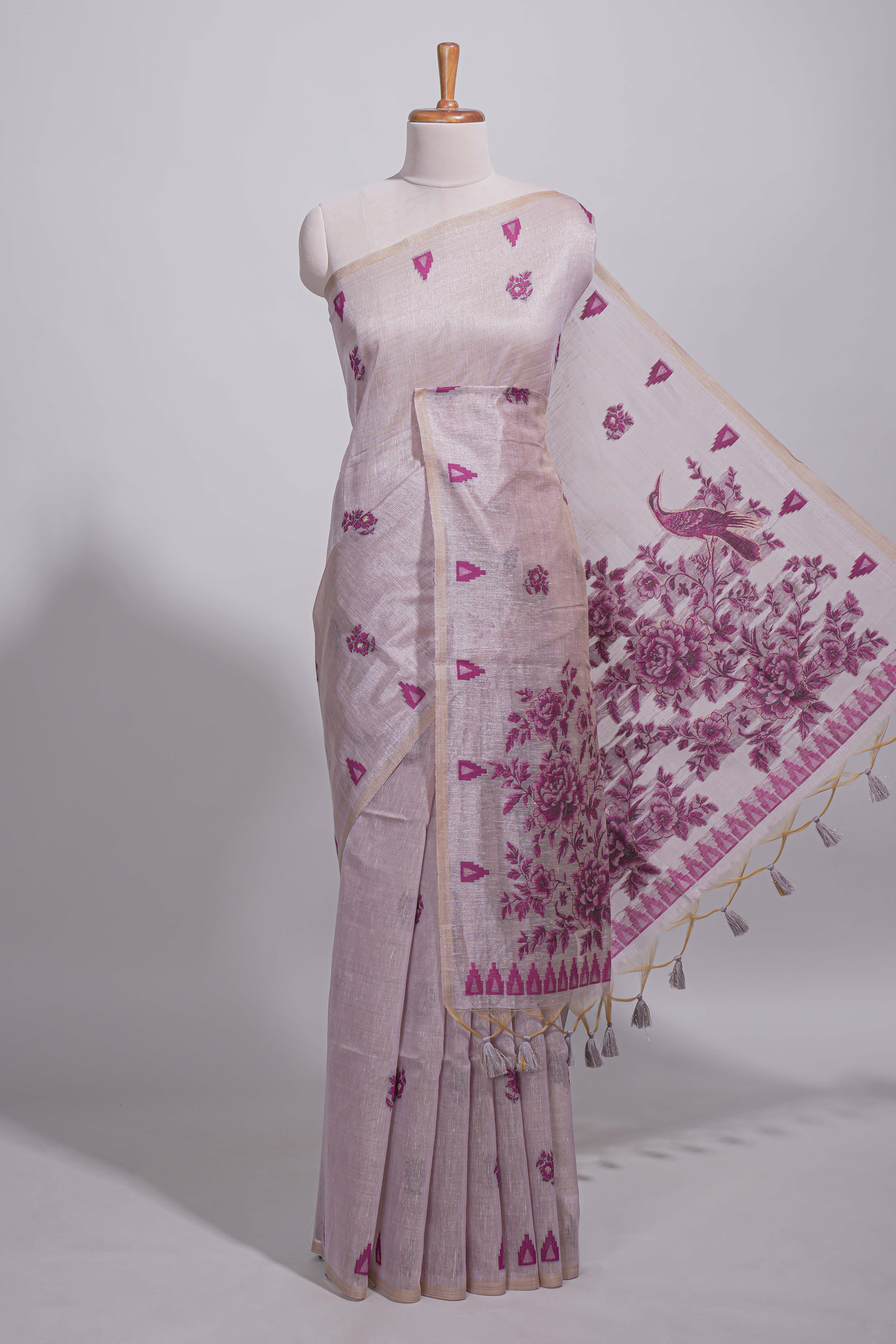 Magenta munga cotton all over floral thread motifs thread weaving border with floral jaal thread zari pallu and contrast small butta blouse