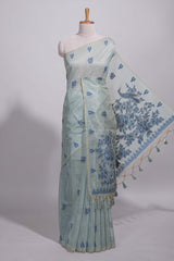 Blue munga cotton all over floral thread motifs thread weaving border with floral jaal thread zari pallu and contrast small butta blouse