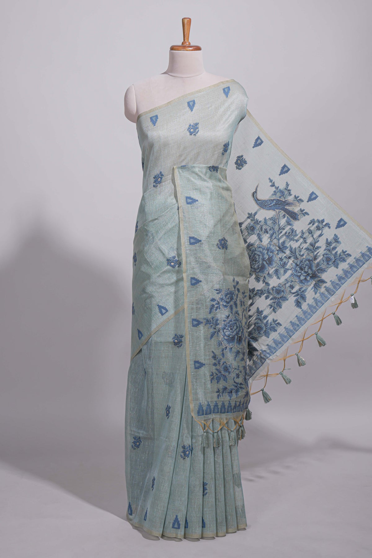 Blue munga cotton all over floral thread motifs thread weaving border with floral jaal thread zari pallu and contrast small butta blouse