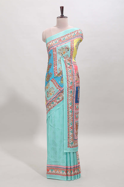 Turquiose blue floral design mirror work masakali saree with self border and matching blouse