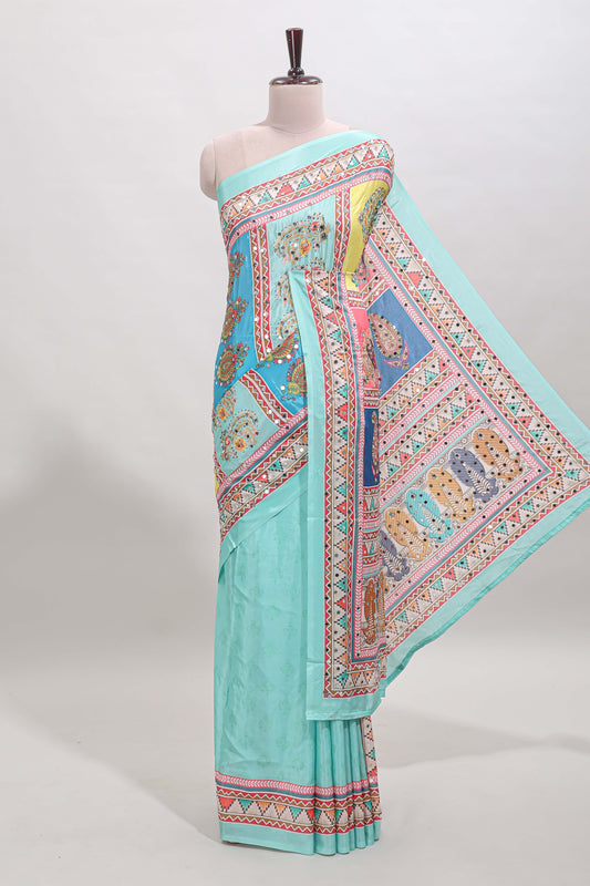 Turquiose blue floral design mirror work masakali saree with self border and matching blouse