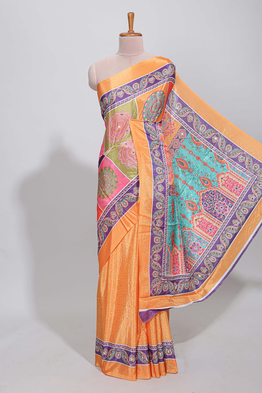 Orange floral design mirror work masakali saree with self border and contrast motifs blouse